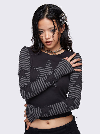 Black long-sleeve top with grey striped sleeves, a striped star patch on the front, and black stars on the sleeves. Features lettuce edge trims, reverse stitching, and a rounded neckline in a slim fit.