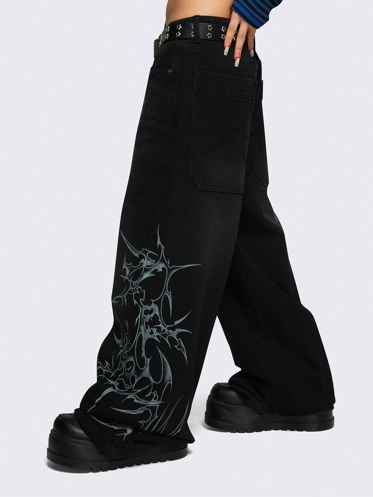 Baggy jeans in black with sigilism graphic print