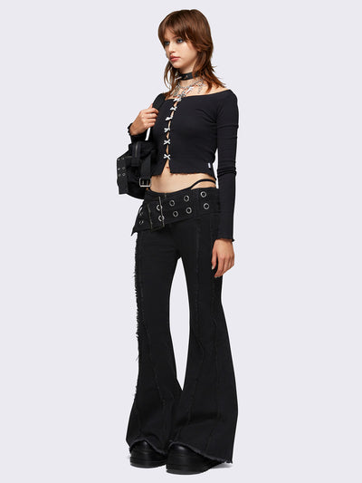 Flared jeans in black with chunky buckle belt