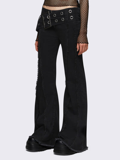 Flared jeans in black with chunky buckle belt