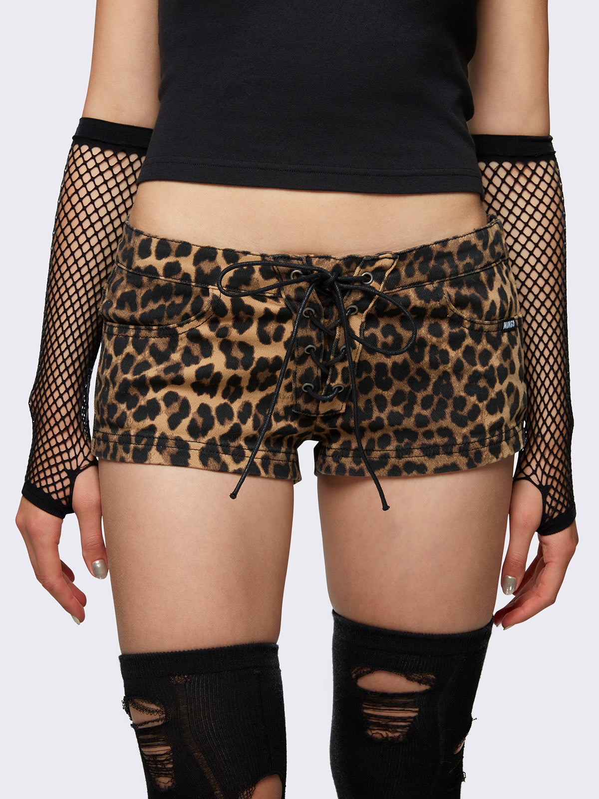 Mini shorts in leopard print with lace up