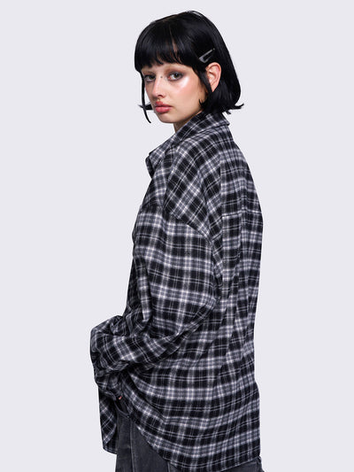 Plaid oversized shirt in black and grey with front button placket.