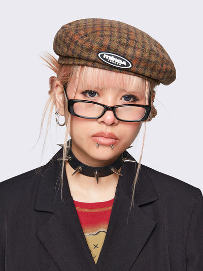 Beret hat in checkered brown