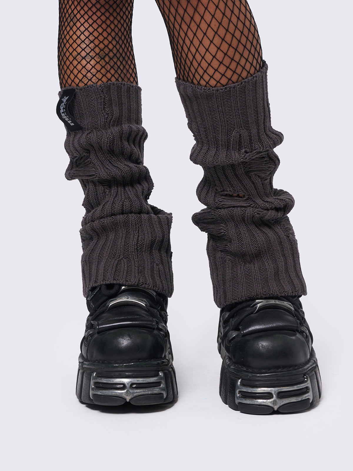 Knitted flare leg warmers in dark grey with distressed details