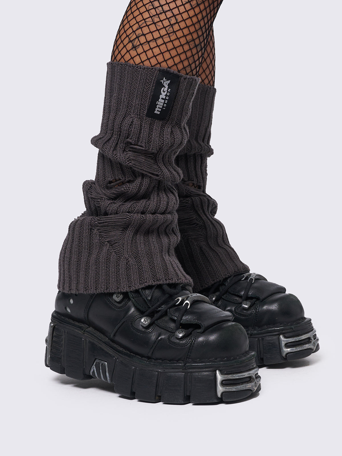 Knitted flare leg warmers in dark grey with distressed details