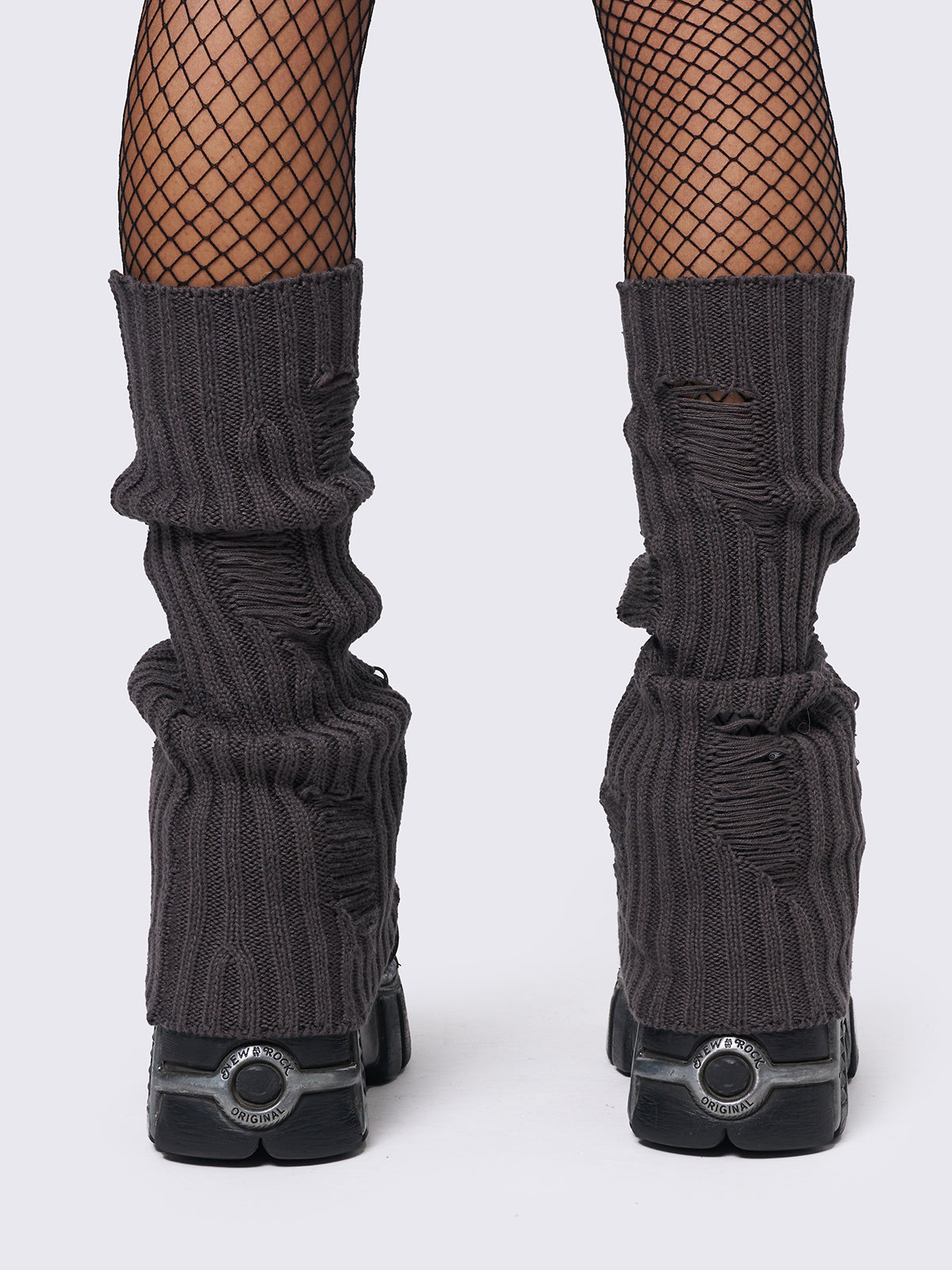 Knitted flare leg warmers in dark grey with distressed details