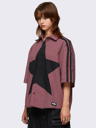 Checkered shirt in red with black star patch