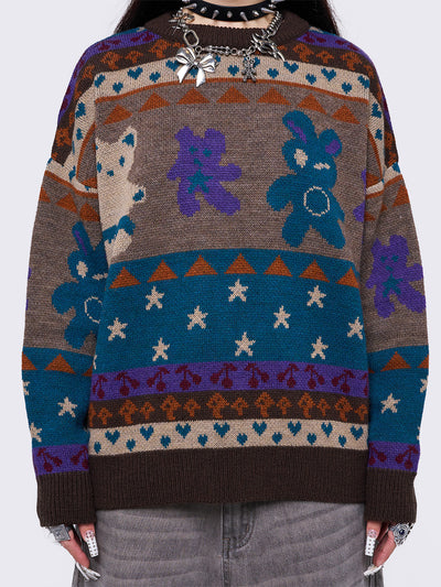 Jacquard knit jumper with playful motifs including teddy bear, stars, cherries and more.