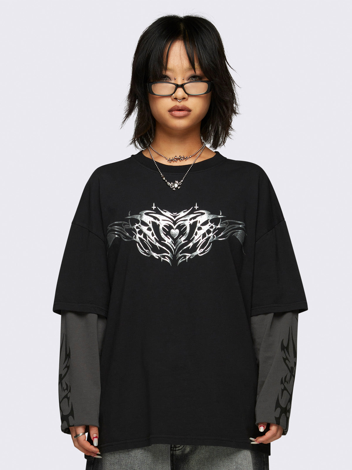 Graphic layered long sleeve t-shirt in black with contrast sleeves in grey