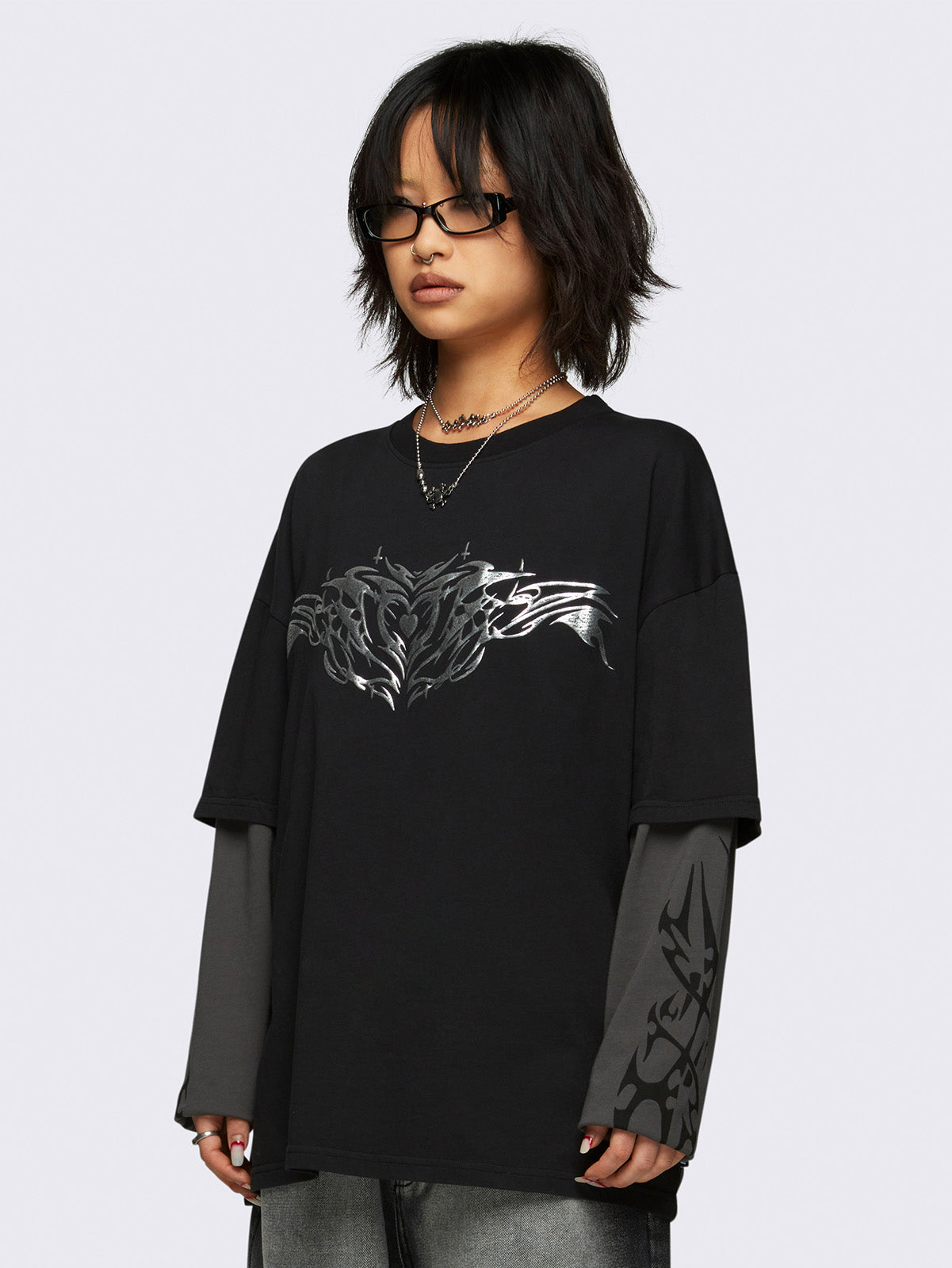 Graphic layered long sleeve t-shirt in black with contrast sleeves in grey