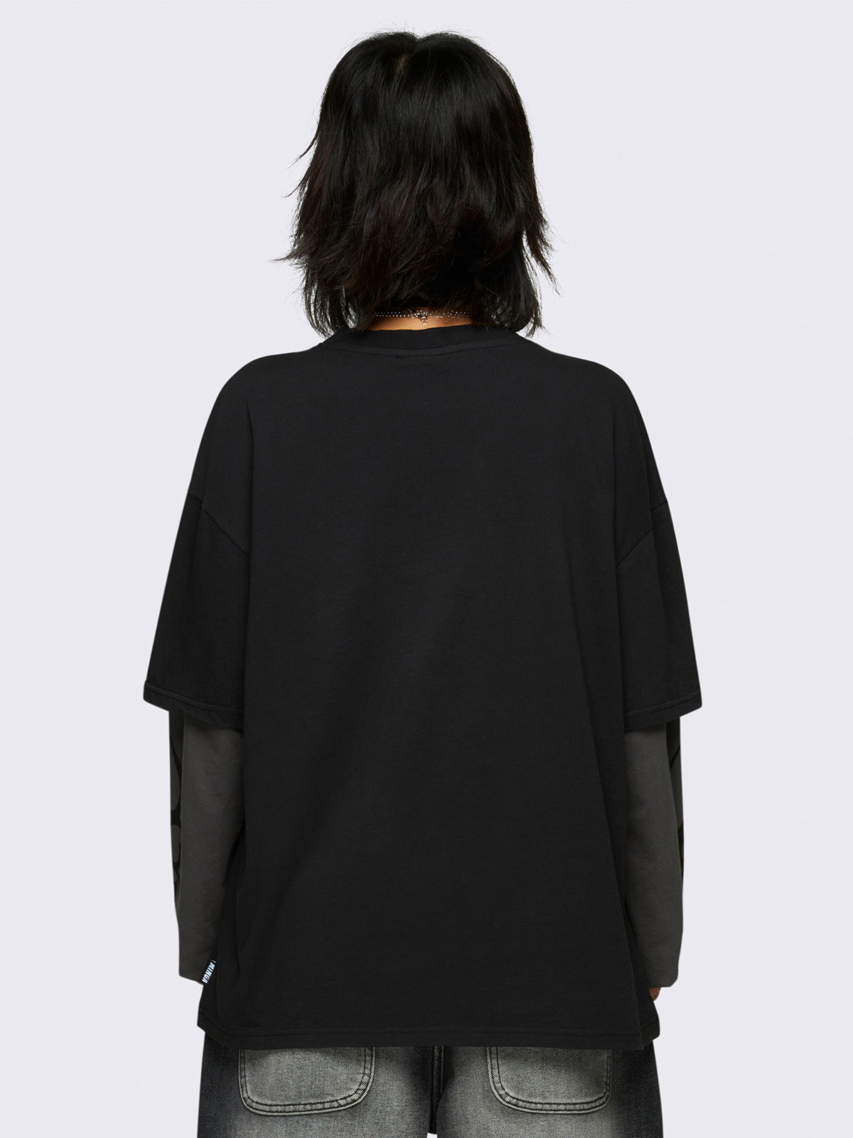 Graphic layered long sleeve t-shirt in black with contrast sleeves in grey