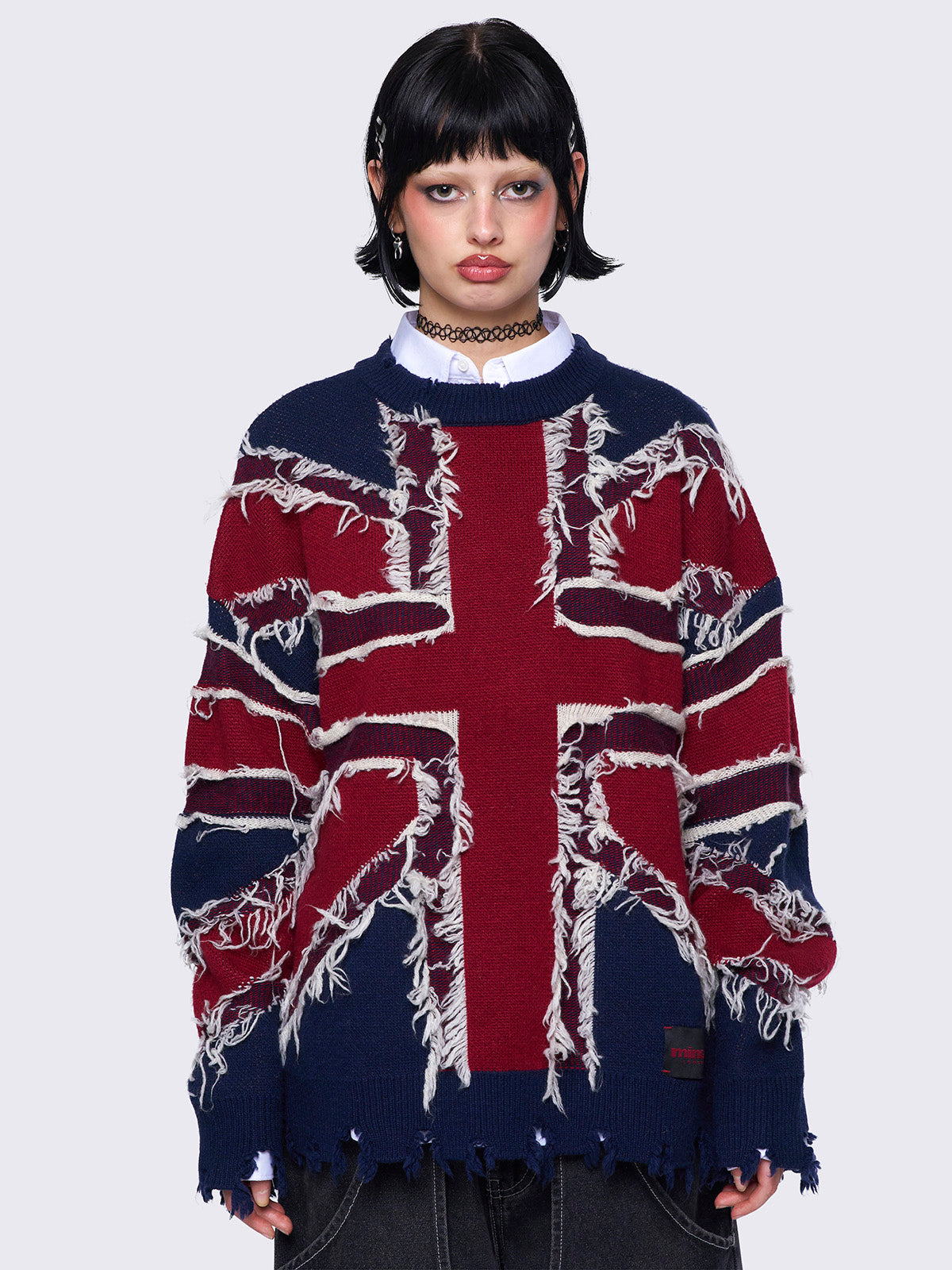 Knitted jumper with frayed uk flag and distressed details