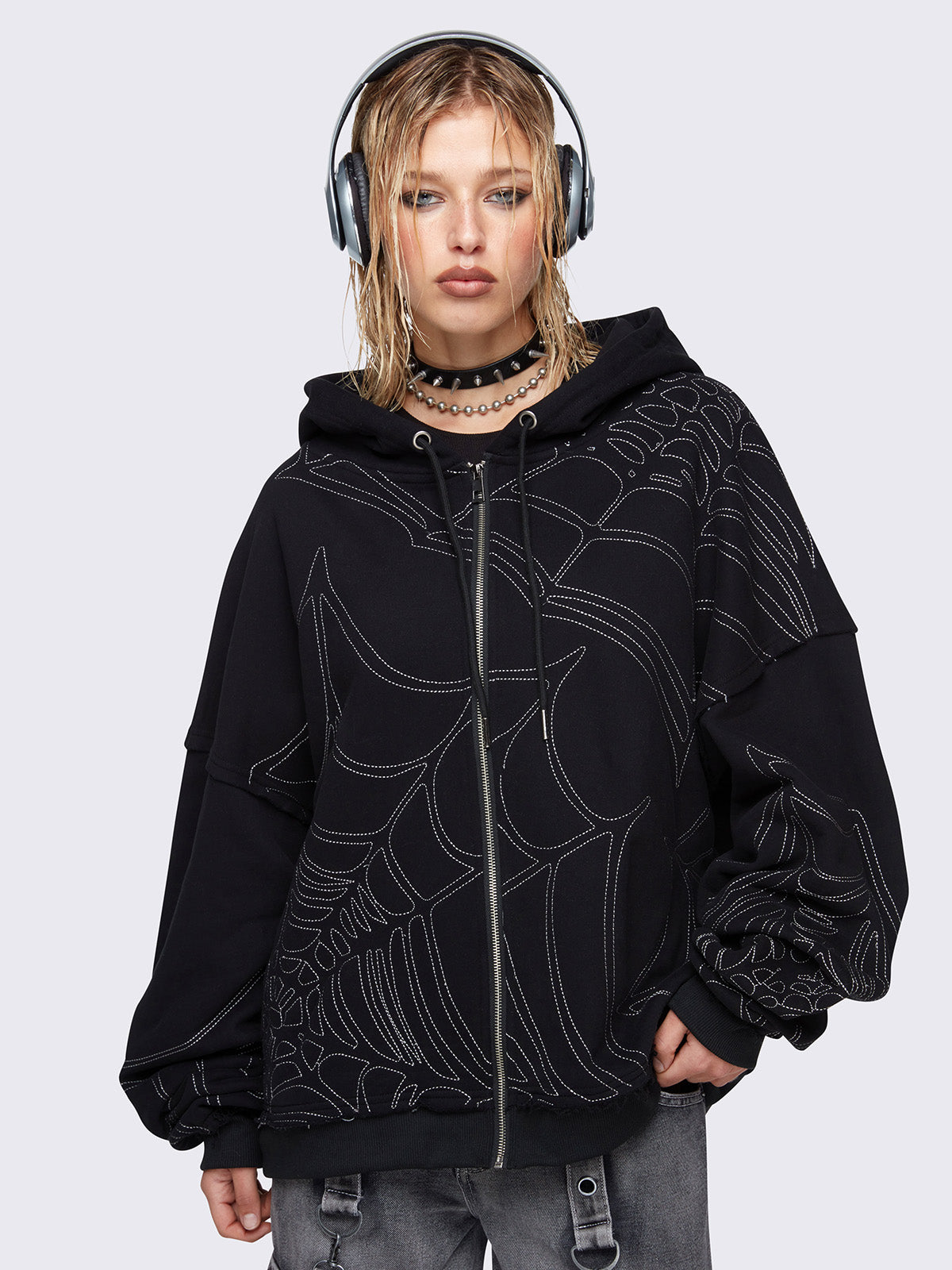 Zip up hoodie jacket in black with spider web graphic embroidery