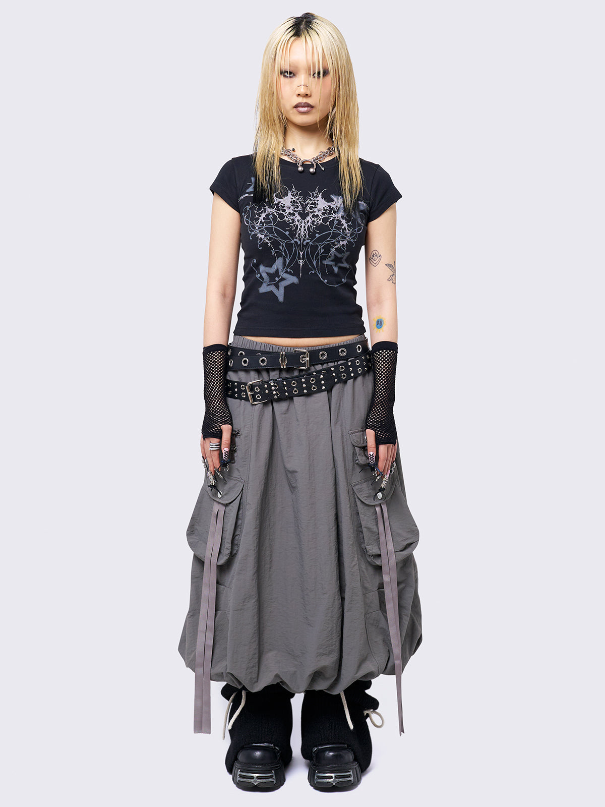 Grey bubble midi skirt featuring balloon style and utility cargo pockets with straps.