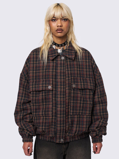 Wool bomber jacket in brown, blue and burgundy plaid pattern featuring a boxy oversize fit