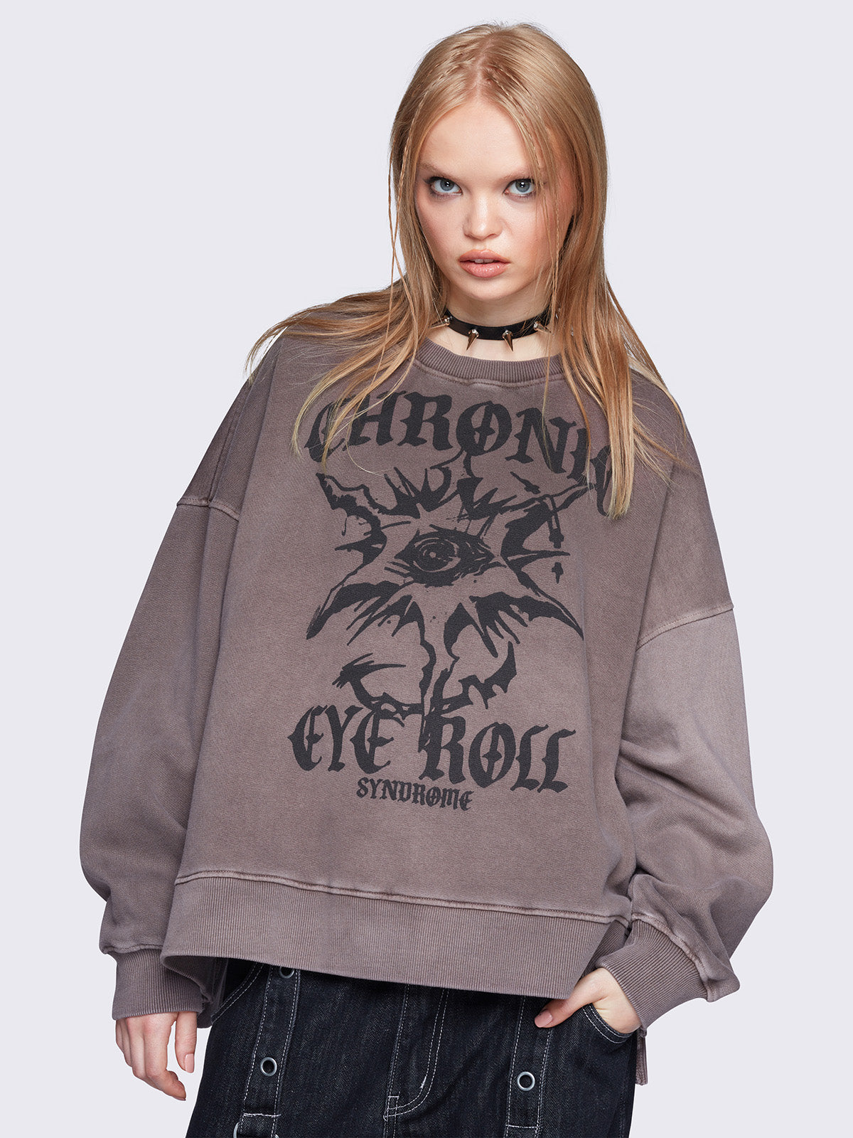 Oversized sweatshirt in washed brown with graphic front print.