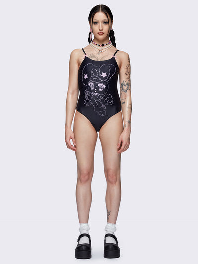 One-piece swimsuit in black with bunny graphic front print and pink laced up at back