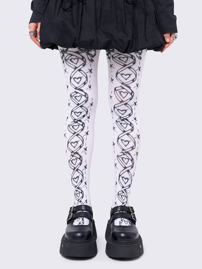 Opaque tights in white with black lace-up corset print.