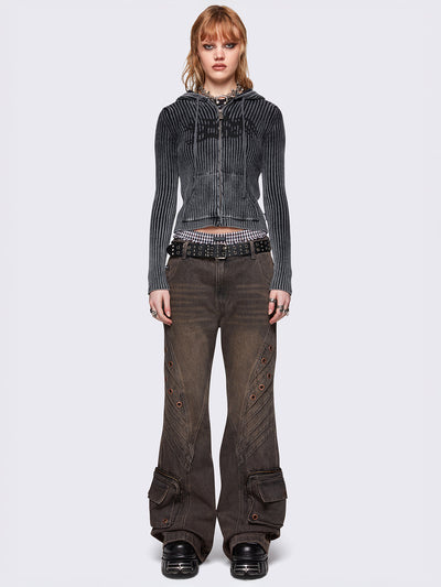 Grey washed flare baggy jeans with brown overdye, twist seam, eyelet details and utility ankle pockets.