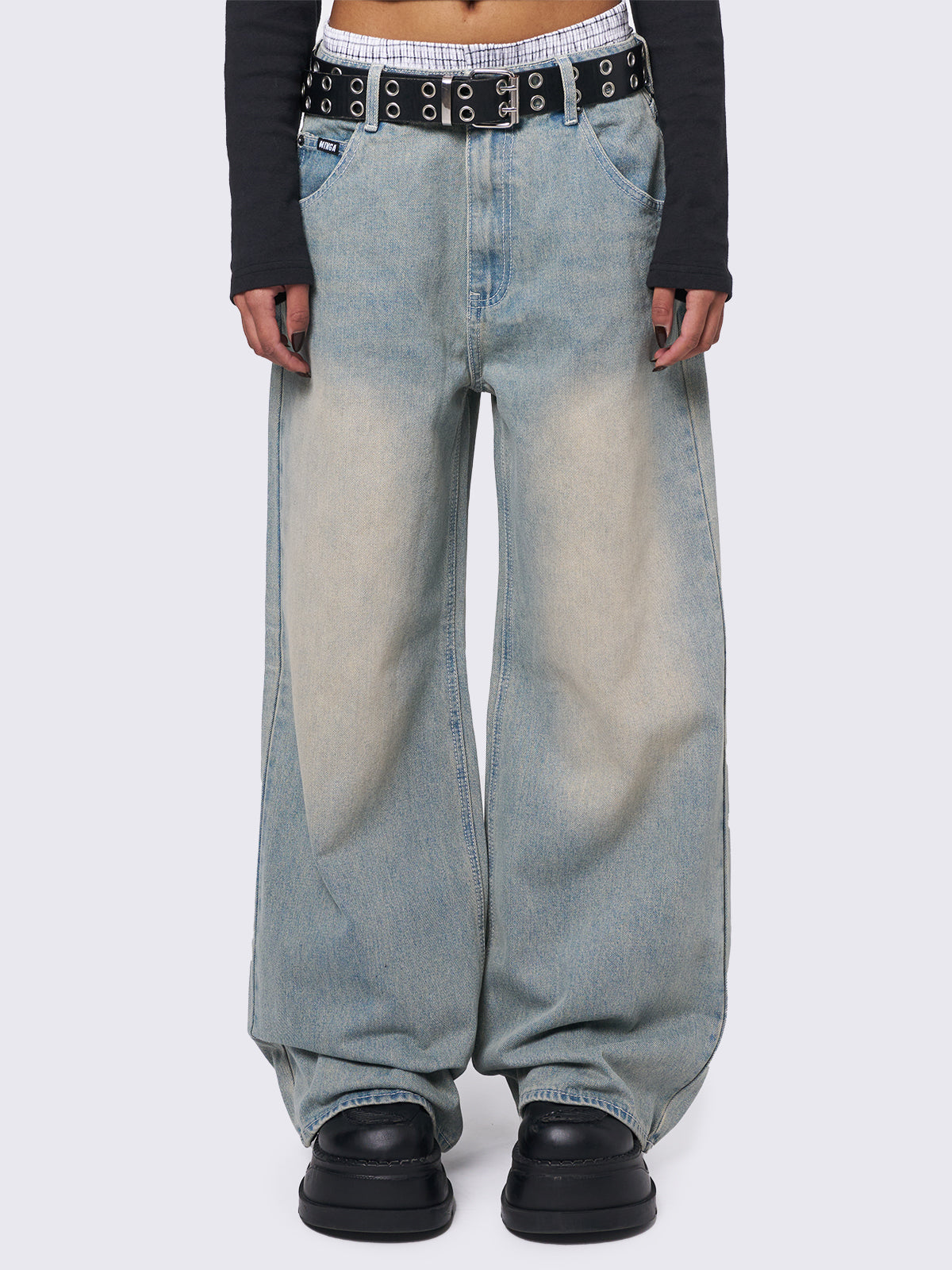 Baggy wide leg jeans in washed light blue with bege overdye wash