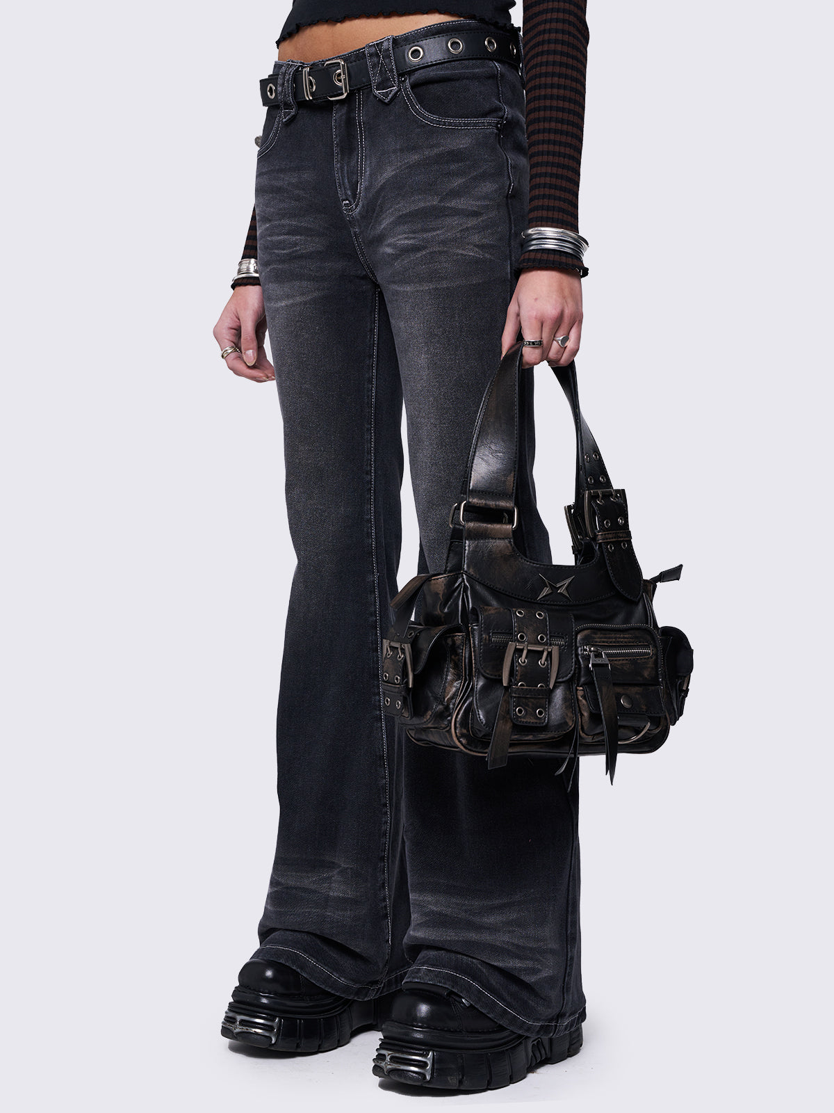 Flared overdye jeans in washed black.