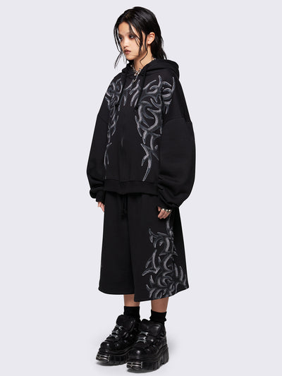 Black oversized zip up hoodie jacket with sigilism graphic front print.