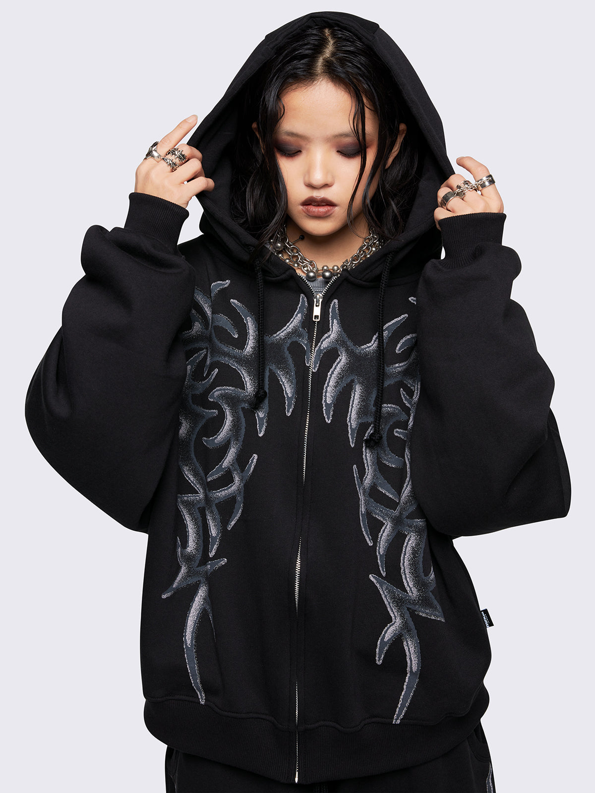 Black oversized zip up hoodie jacket with sigilism graphic front print.