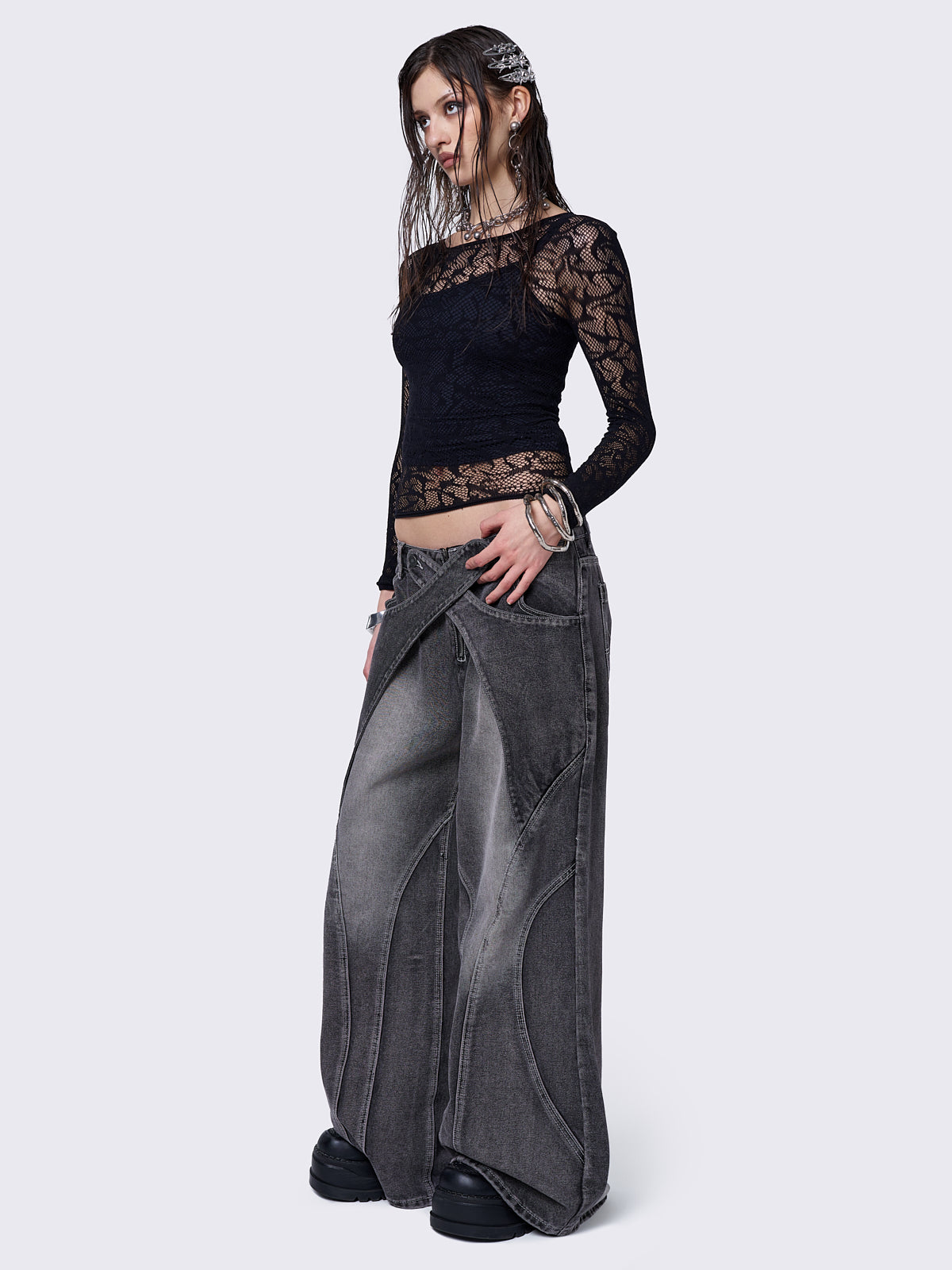 Black washed baggy jeans with grey overdye and cross panels and seams details. 