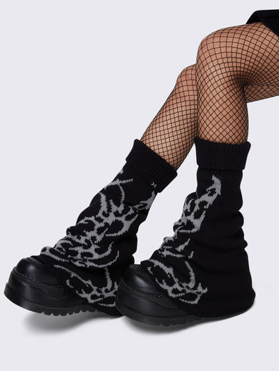 Flared leg warmers in black and sigilism graphic design in grey