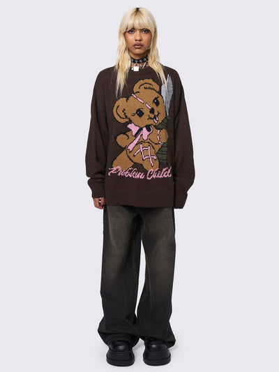 Jacquard knitted jumper in brown with "Problem Child" Teddy Bear front graphic design.