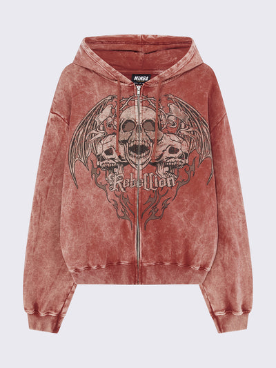 Zip up hoodie jacket in washed terracota red with rebellion skull graphic front print and drawstring hood.