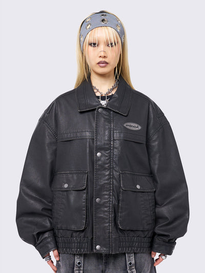 Black washed faux leather bomber jacket featuring a boxy oversize fit.