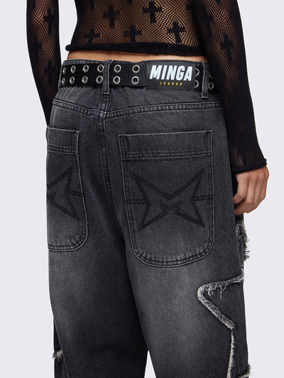 Baggy jeans in washed black with frayed star patches and wide leg fit. 