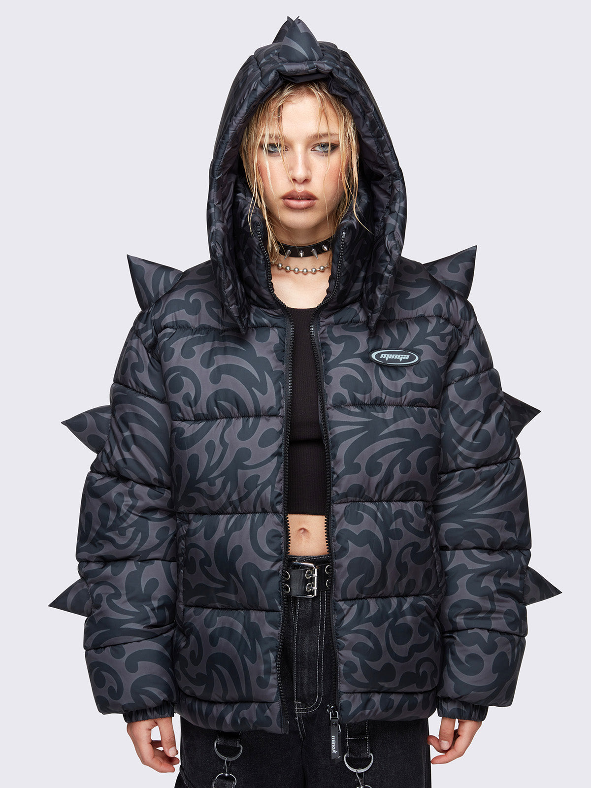 Hooded puffer jacket in grey with tribal print all over in black and 3D spikes