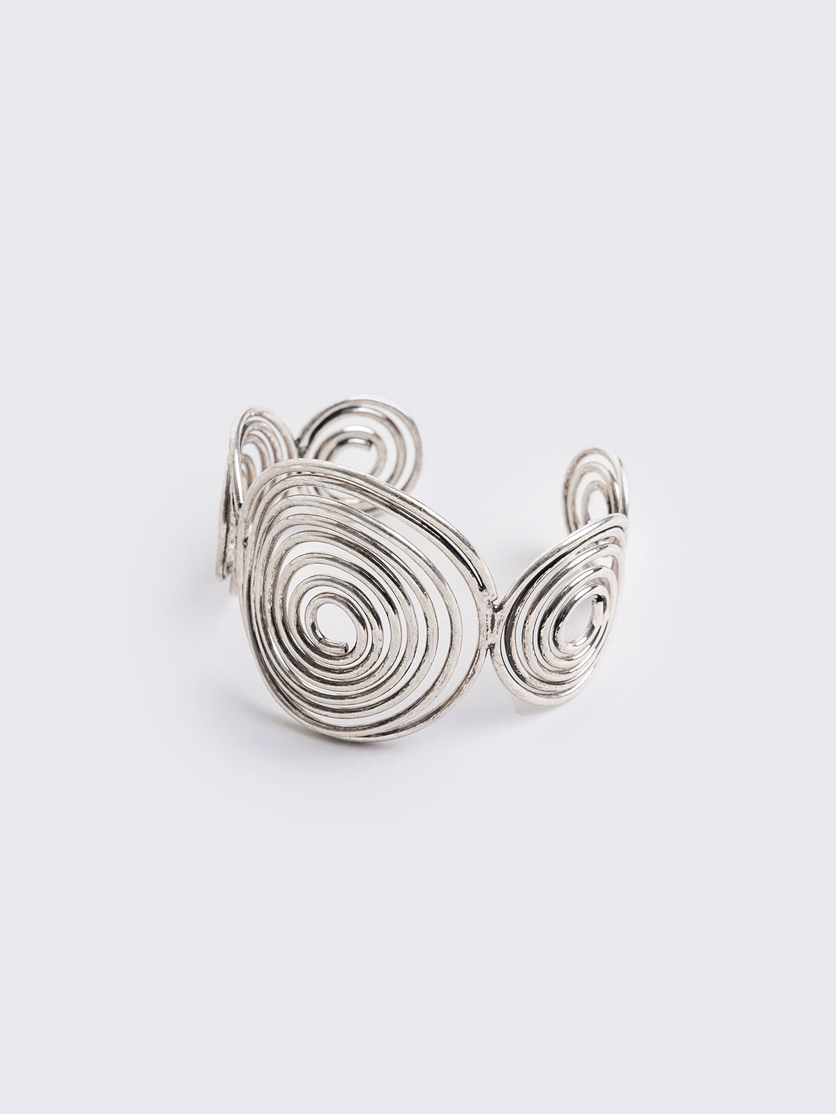 Silver swirl cuff bracelet.